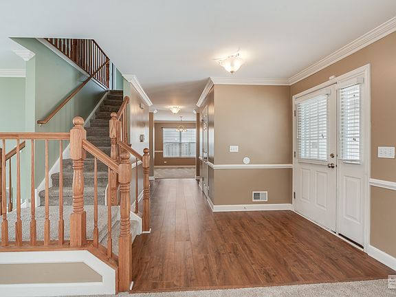 Gorgeous entry with a split staircase, this will impress all of your guests!