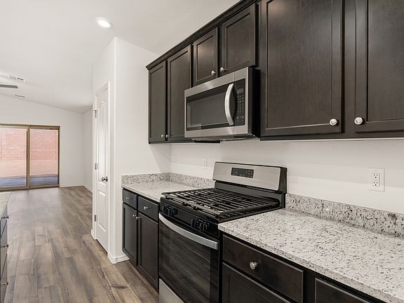 The kitchen opens up to the family room