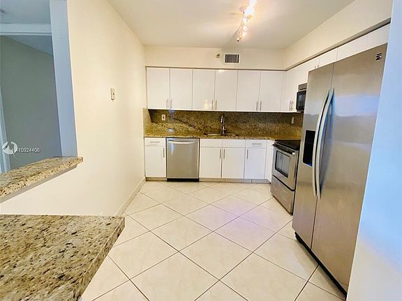 3rd image of 3530 Mystic Pointe Dr APT 407
