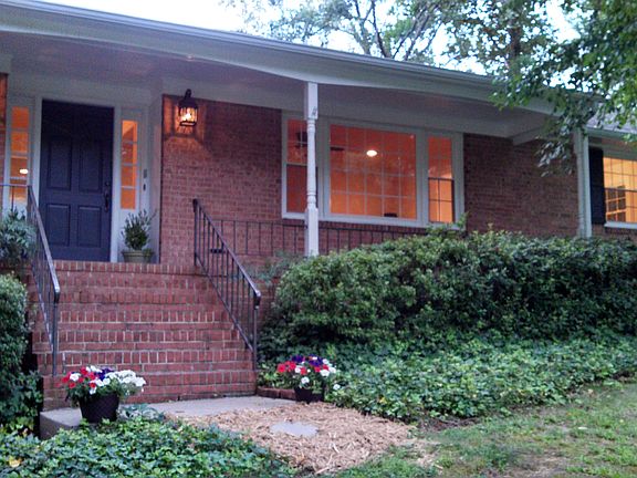 Lovely front porch and picture window, brick construction.