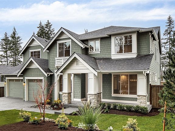 The Stipek plan on Lot 9 is UNDER CONSTRUCTION! This photo is taken of a sold home of the same floorplan in a different community.  Home has not yet been painted.  Colors, Design, Features are subject to change.