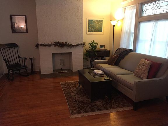 Bright living room with decorative fireplace