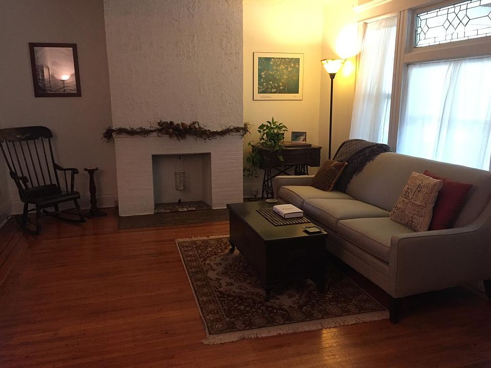 Bright living room with decorative fireplace