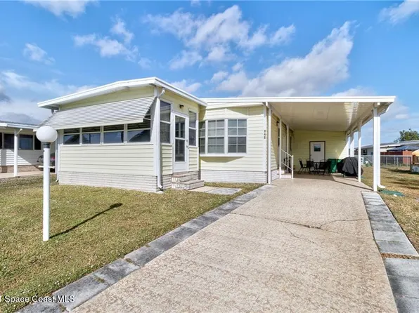 942 Wren Cir, Barefoot Bay, FL 32976