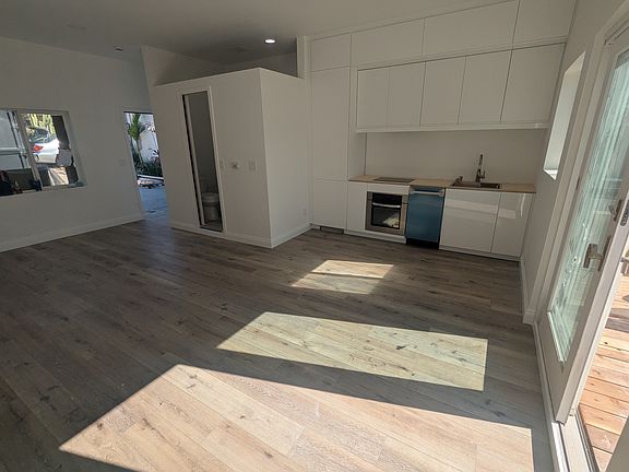 Fully equipped kitchen with fridge/freezer, oven, 2 burner stove top, BOSCH dishwasher, plenty of storage space.
Picture taken during remodel; remodel expected to be completed mid Apr2025.