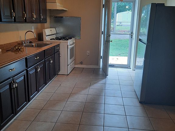 Kitchen with appliances, tenants can bring their appliances it needed