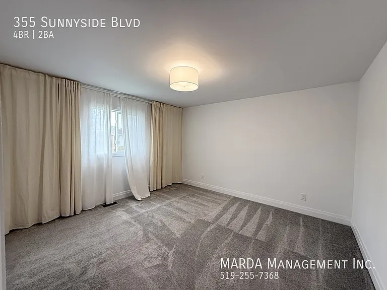 355 Sunnyside Blvd — Photo 33