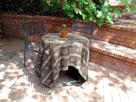 Two Private Brick patio areas large enough for dinner partie