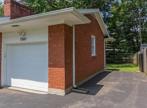 1-car garage with parking pad