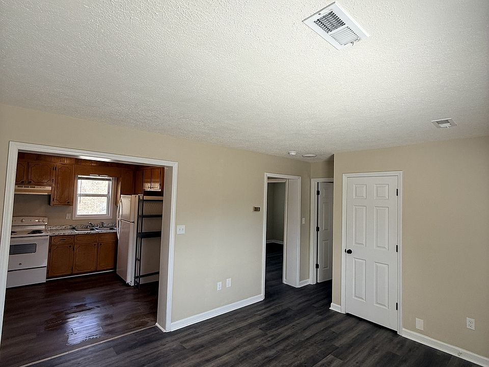 Living room view to kitchen and two bedrooms / bathroom