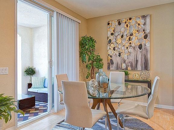Dining room with view of outdoor patio.