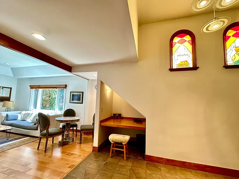 Living and nook and stained glass