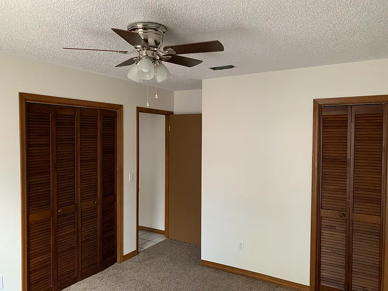 Left bedroom features two closets.