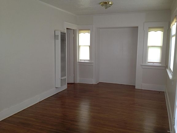 North side of living room. Door to bedroom.