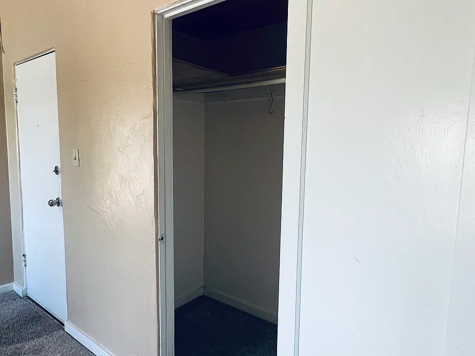 Walk-In Closet in Living Room Space