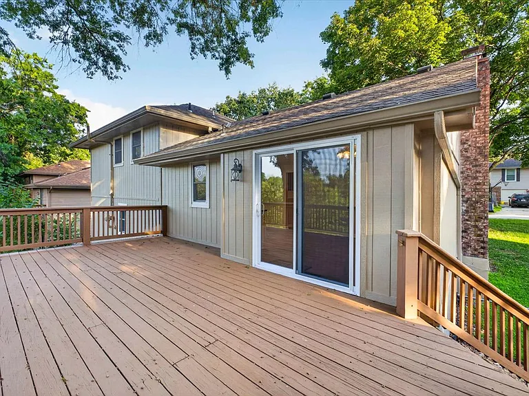 Large deck off Kitchen and is partly shaded