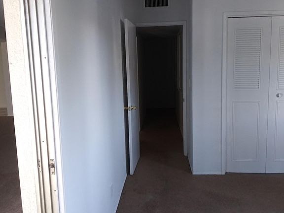 from bedroom down the hall to bathroom