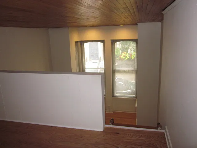 Living Room and Bay Window View From Loft