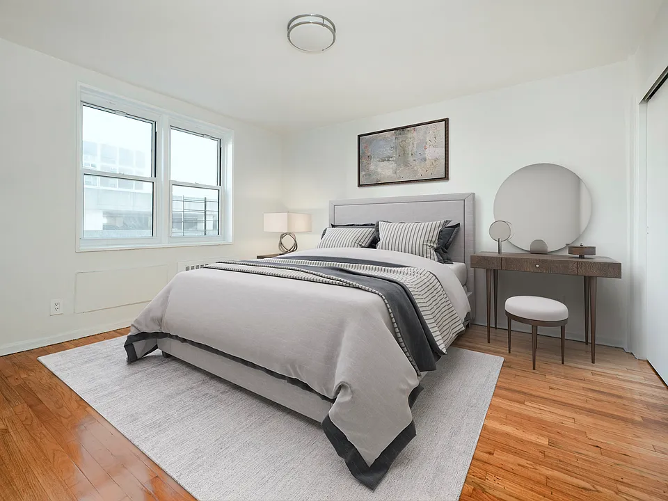 Step into serene living at 40 Barker Avenue. This beautifully designed bedroom offers comfort and style, featuring large windows for natural light and a cozy ambiance. Elevate your lifestyle todayschedule a visit!