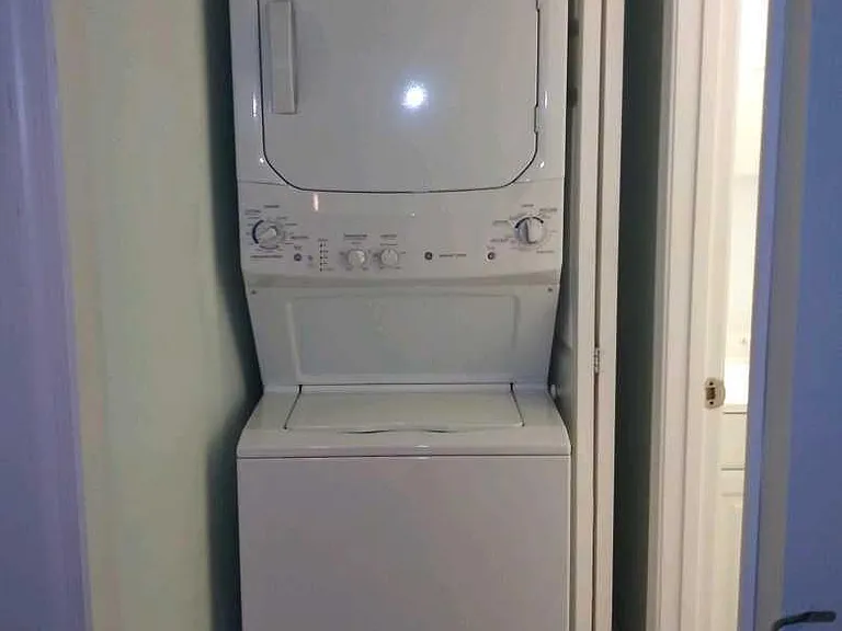 Washer & Dryer off of living room - next to half bathroom