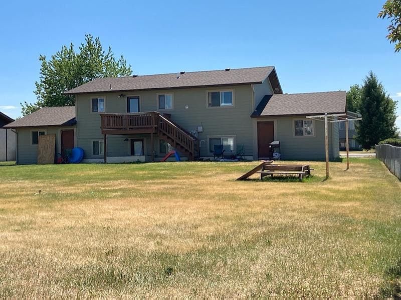 Deck on back of unit with access to the garage and shared backyard.