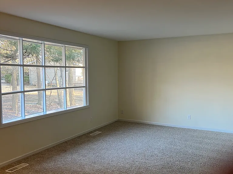 Large living room with large bay window