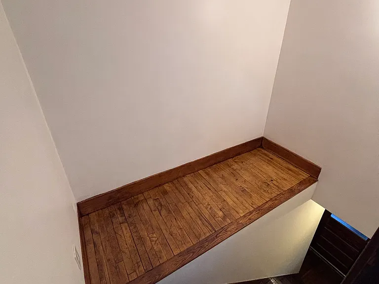 Back private entrance with storage that leads to basement with washer and dryer