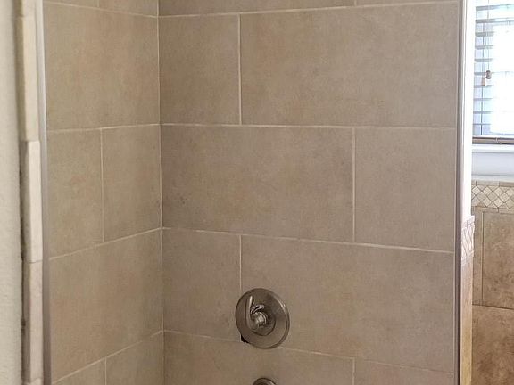 New Main Bath Tub & Tile Surround.