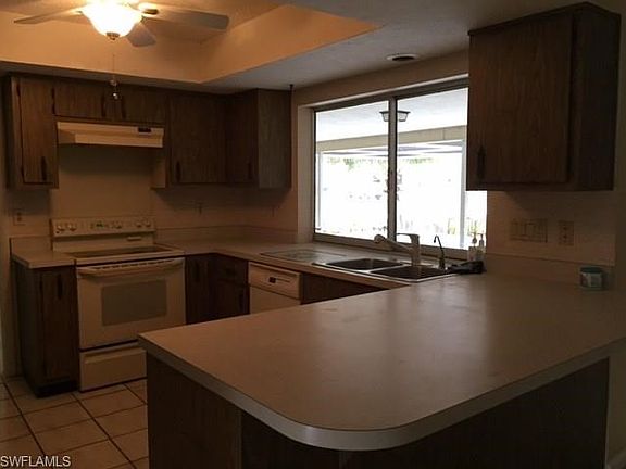 The pass-through window is a pocket slider so when open, no glass is visible and allows for great ai