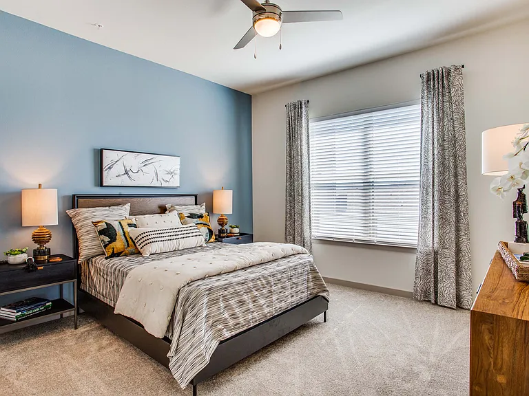 Primary bedroom with ceiling fan