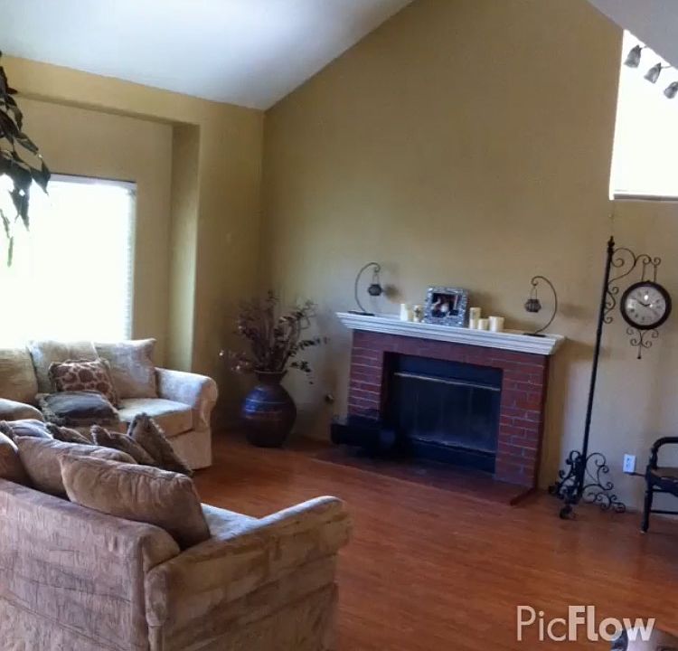 LIVING ROOM WITH BRICK FRPLC