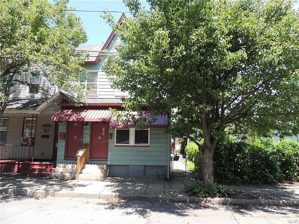 Front of Property - Door to Left