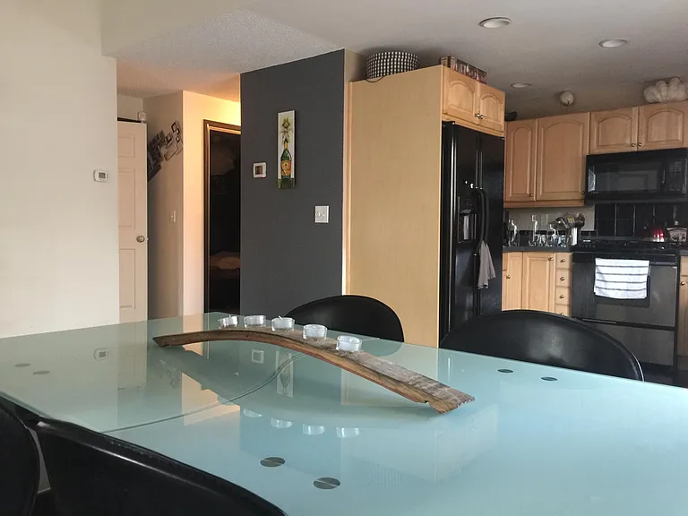 Living space is connected to kitchen.