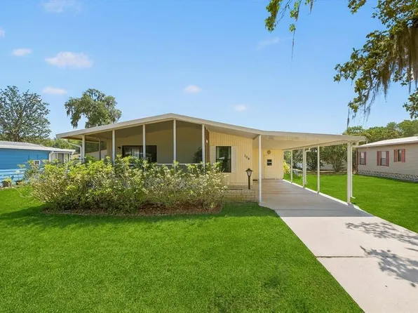 104 WINTERBERRY AVENUE, WILDWOOD, FL 34785