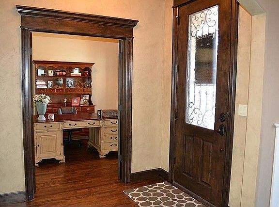 Entry with solid hardwood front door