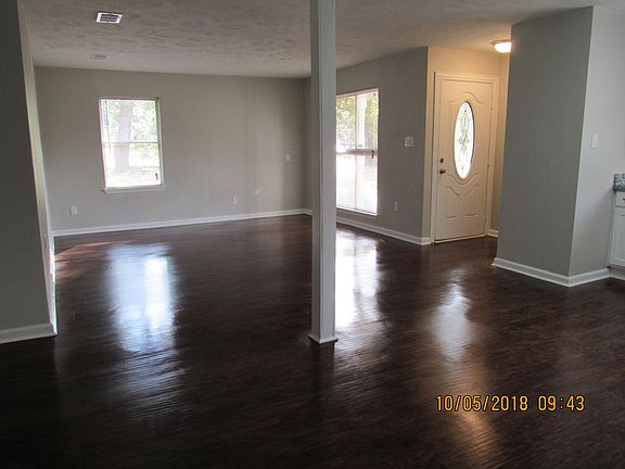 Open concept living spave with large family room and dining