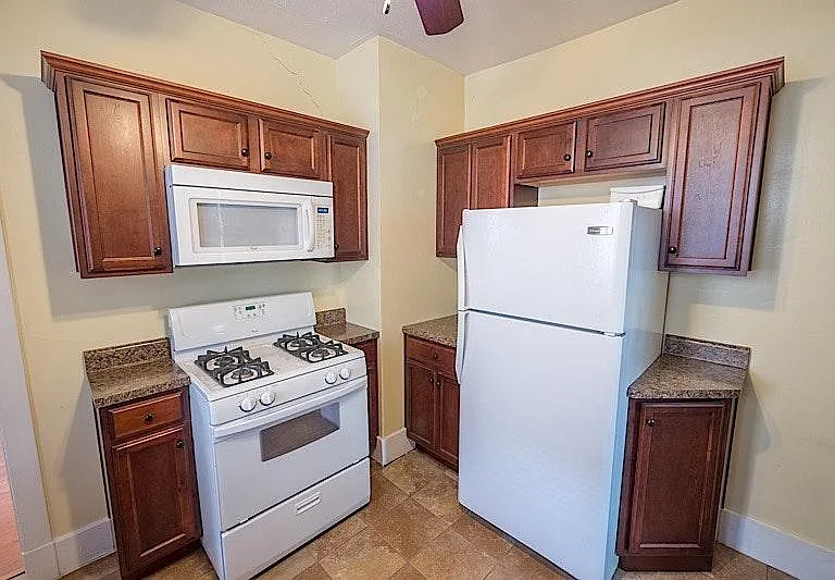 Ceramic tiles floors, appliances Micro, dishwasher, refrigerator, stove.