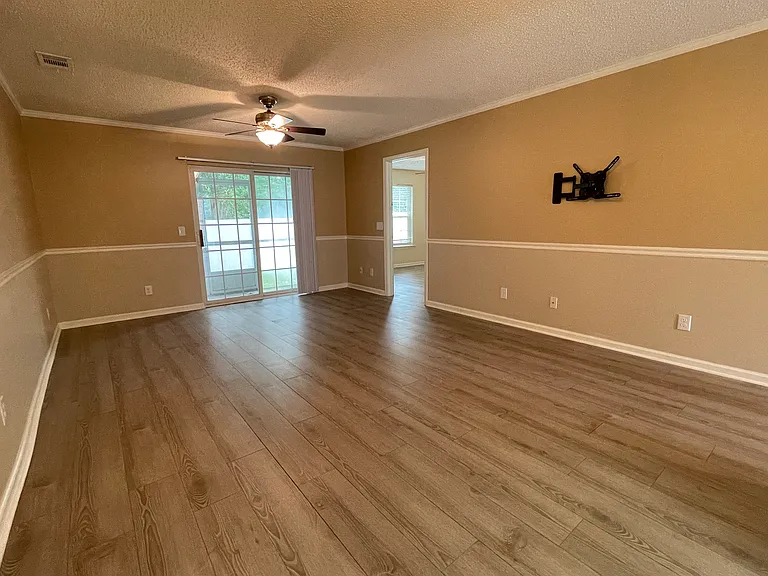 Open-concept living and dining area with lots of natural light