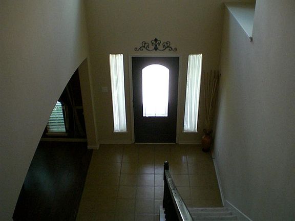 ANOTHER VIEW FROM THE SECOND FLOOR SHOWING THE ENTRY