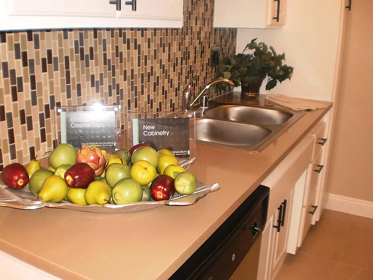 Spacious upgraded kitchen with stainless steel appliances at 1br apartment