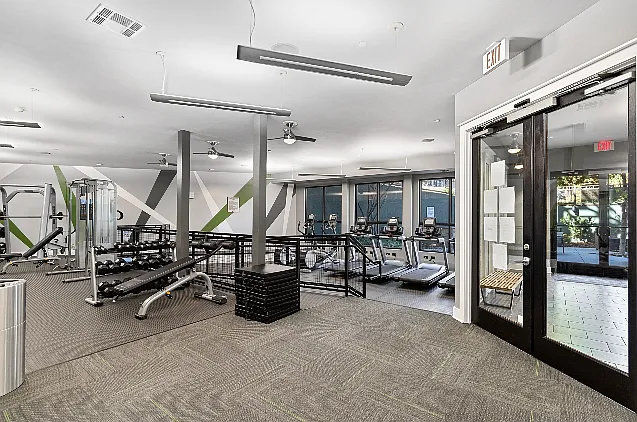 24/7 fitness center with cardio and strength training equipment
