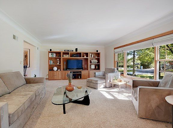 Spacious living room open to the kitchen. Great for gathering.