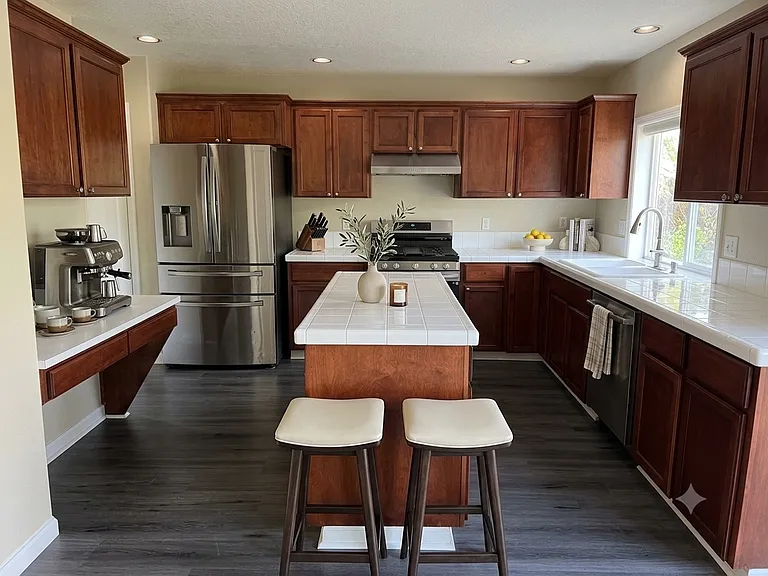6041 NW Calypso Ter — Photo 10