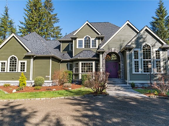 This south facing home draws in the sunlight on a nice day! The big dual pane windows provide for wonderful views looking out. Circular driveway provides plenty of parking space for your larger gatherings!