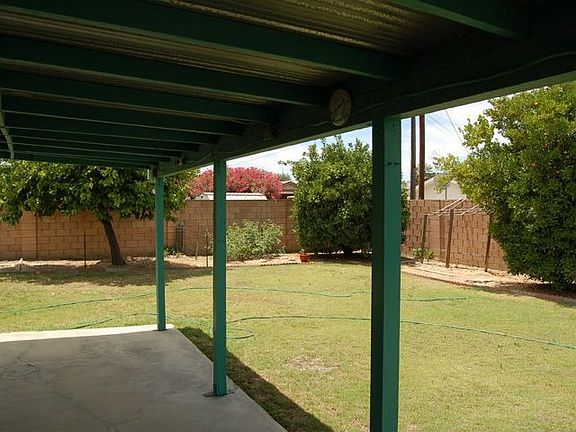 Big backyard with covered patio