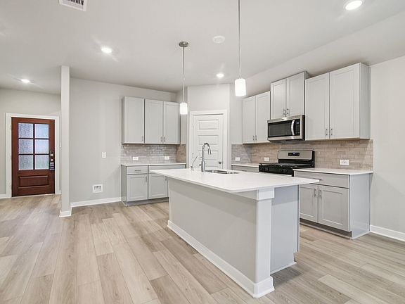 The Oleander floorplan in Kingdom Heights of Rosenberg, TX.