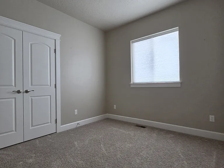 BEDROOM #2 OR GOOD FOR OFFICE WITH DOUBLE DOOR CLOSET.