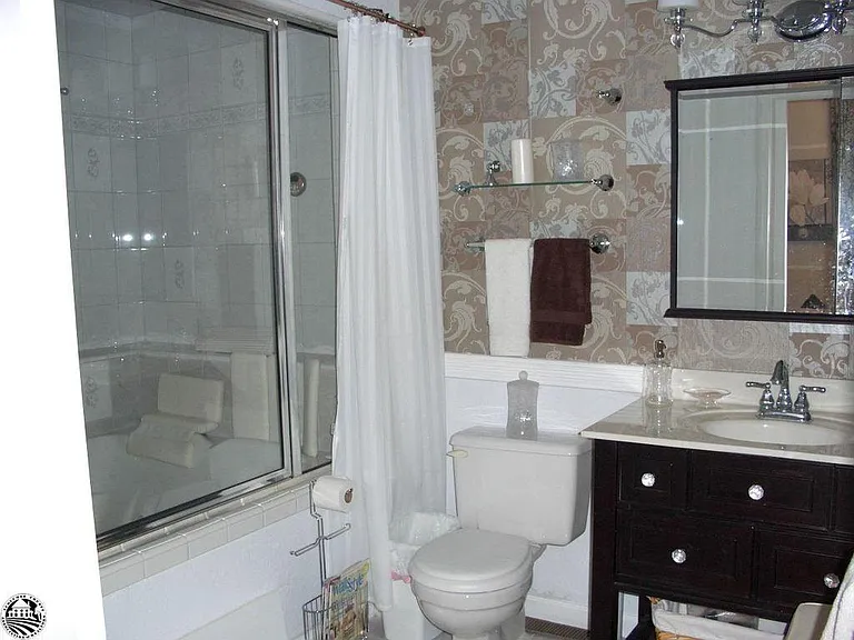 Master bath with double size tub and shower combo
