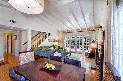 Open Beam, vaulted ceilings, hardwood floors and fireplace in li