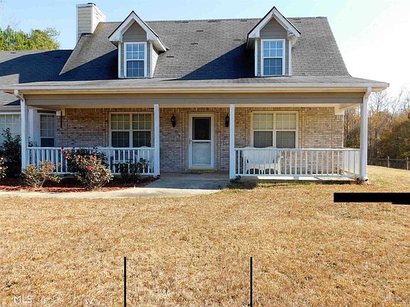 Enjoy the view and the quiet from your rocking chair on this Front Porch.